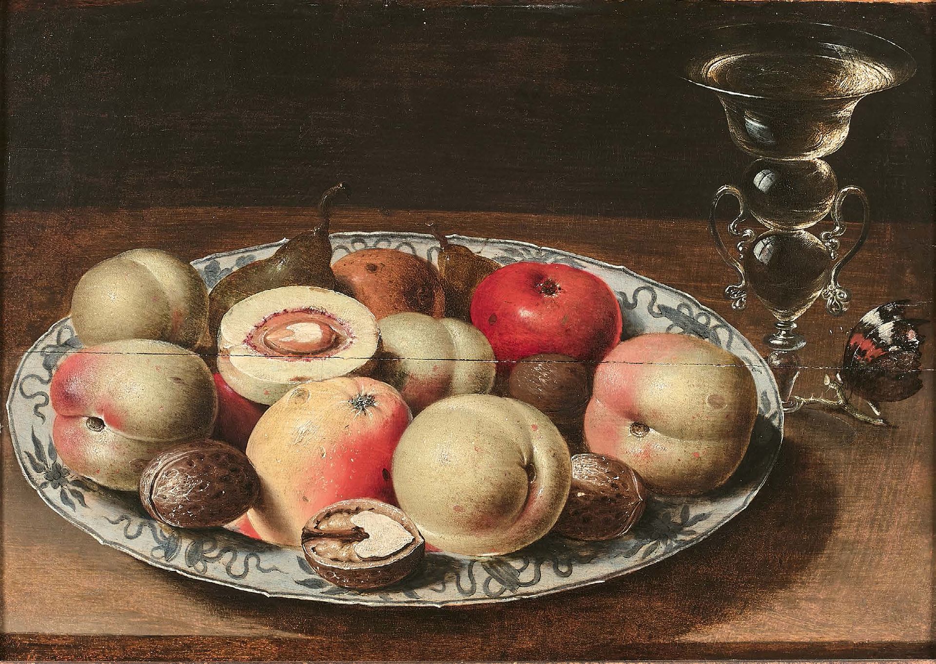 Osias BEERT (Anvers 1580 - Anvers 1624) 瓷盘上有水果和坚果，右边是杯子和蝴蝶
面板上的油彩，镶板。
 （裂缝，修复）。
&hellip;