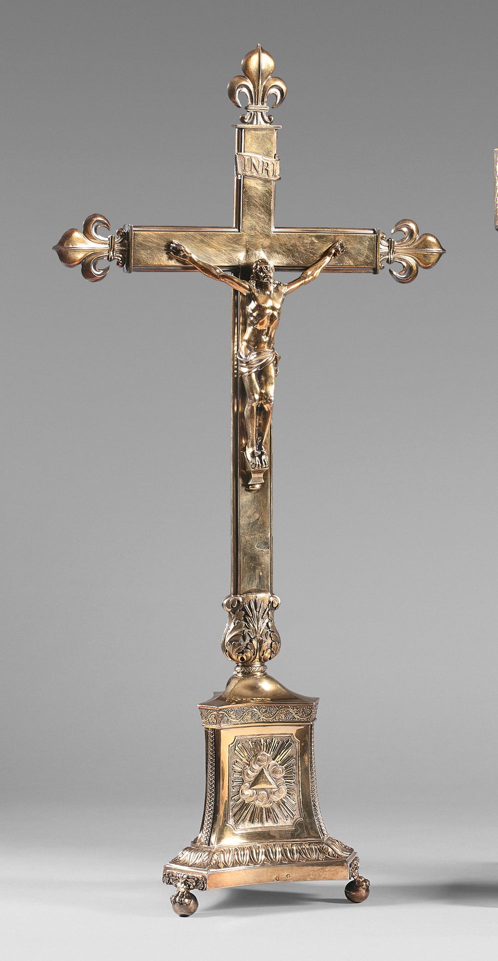Null A vermeil crucifix with fleur-de-lys branches and embossed foliage. Triangu&hellip;