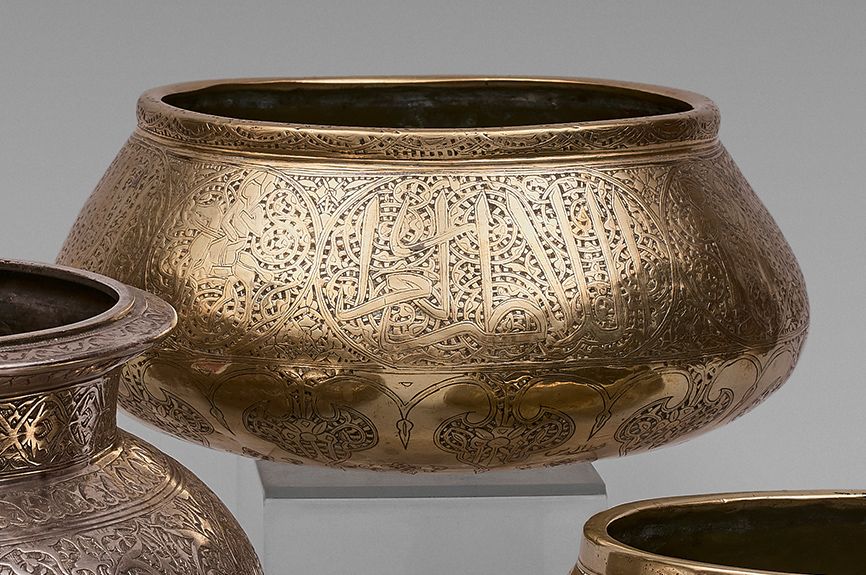 Null Basin from the Fars region. 
 Brass with engraved decoration and inlaid wit&hellip;