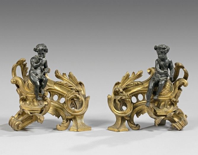 Null Pair of ormolu andirons decorated with a couple of putti in patinated bronz&hellip;