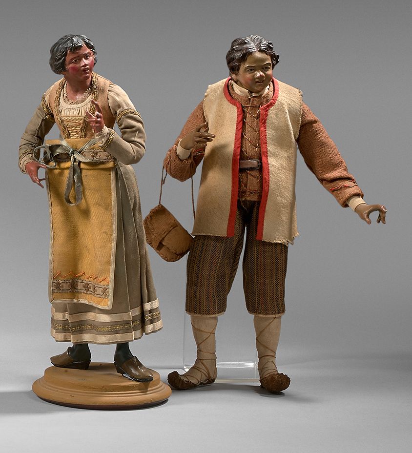 Null Couple in terracotta and polychrome wood, eyes in sulphur.
Height: 32.5 cm