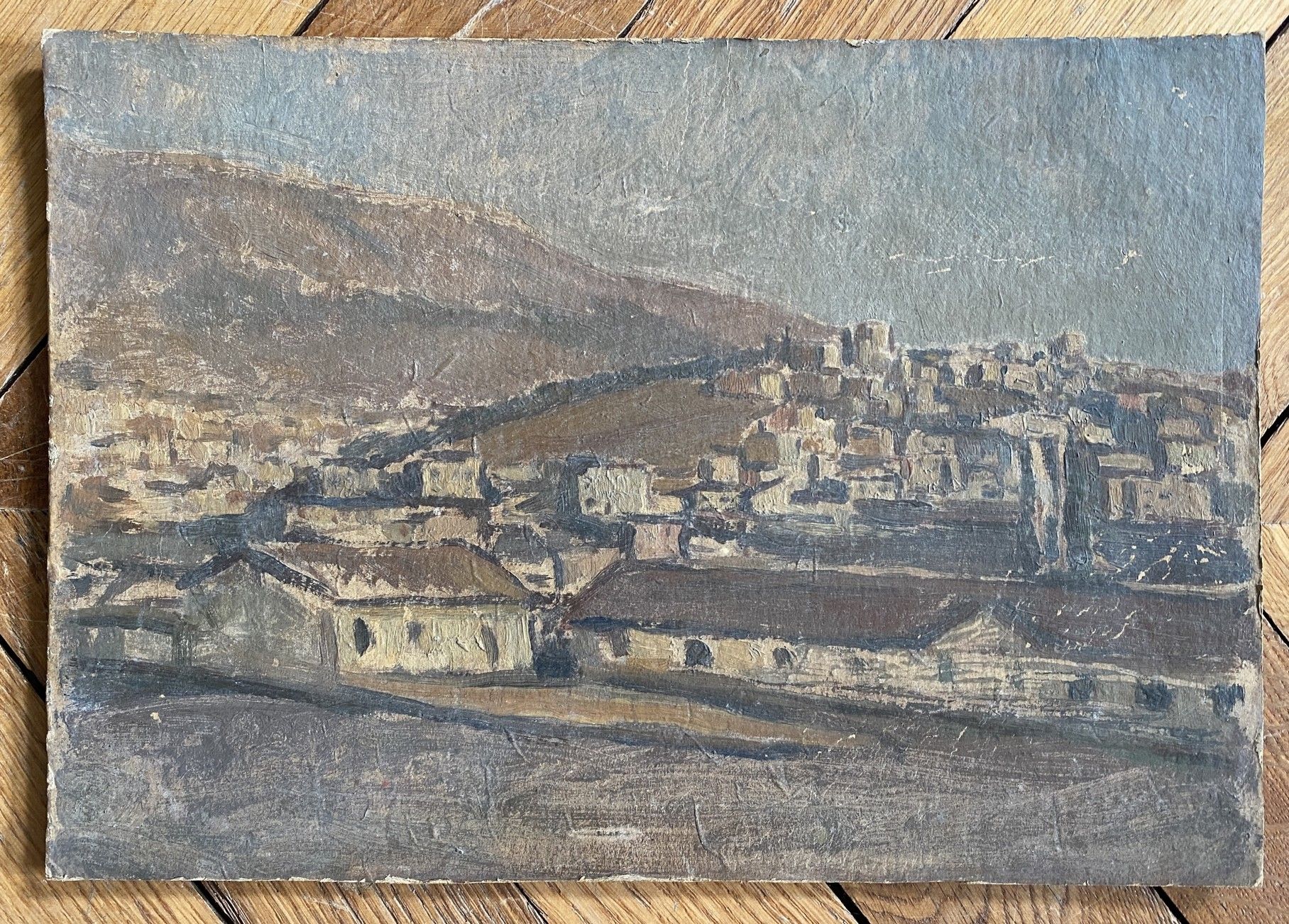 Null 
瓦西里-普蒂亚兹（1903-1975）。




处于丘陵地带的村庄。




木板油画，署名 "V.背面是 "PHOTIADES"。




23&hellip;