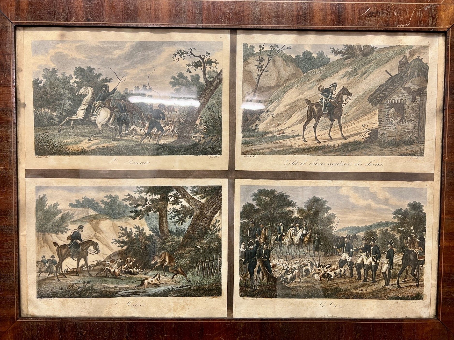 Null 4 engravings of hunting in a mahogany veneer frame (acc, humidity stains).