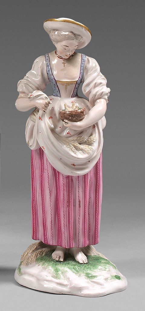 NIDERVILLER Statuette representing a young woman standing on a pedestal holding &hellip;