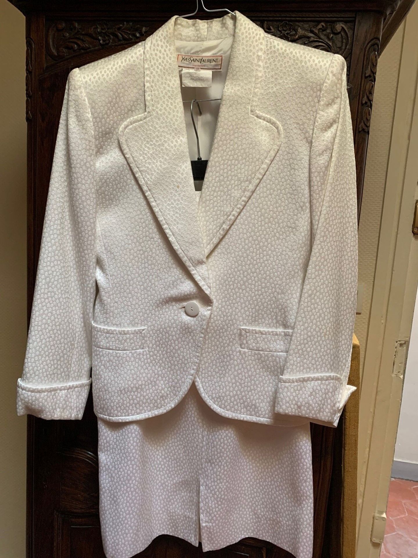 Null Lot : 

YVES SAINT LAURENT Variation: white skirt suit.

COURREGES: cream c&hellip;