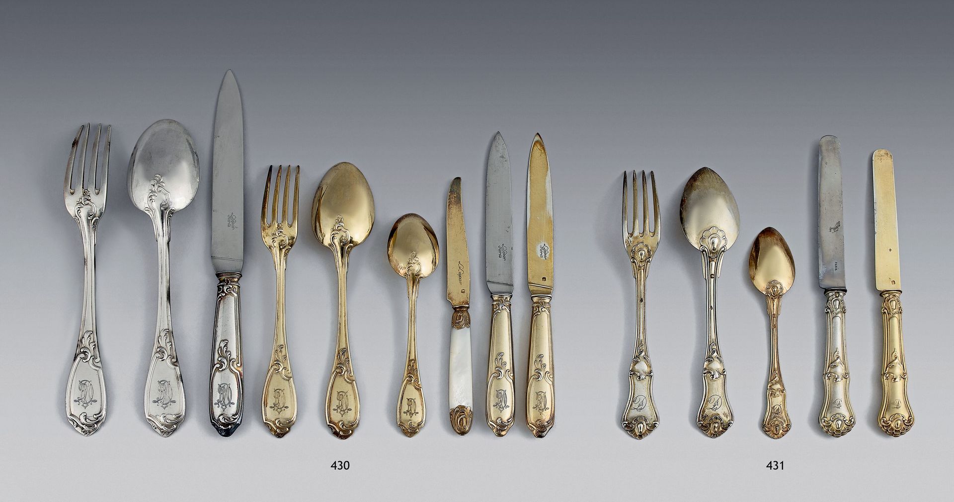 Null 一套银质和镀金的家庭用品的一部分，950千分之一，叶子模型，Monogrammed MD包括：六个叉子和八个餐勺；二十四把餐刀；一把黄油刀；十二把茶匙&hellip;