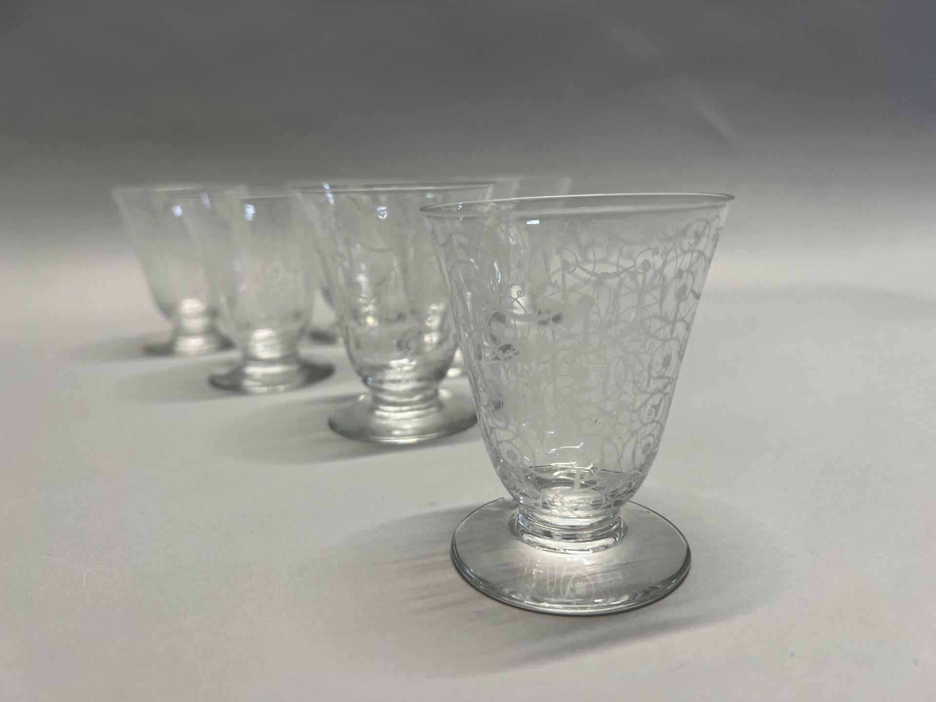 Null BACCARAT 
SET OF SEVEN truncated-cone crystal GOBELETS engraved with lambre&hellip;