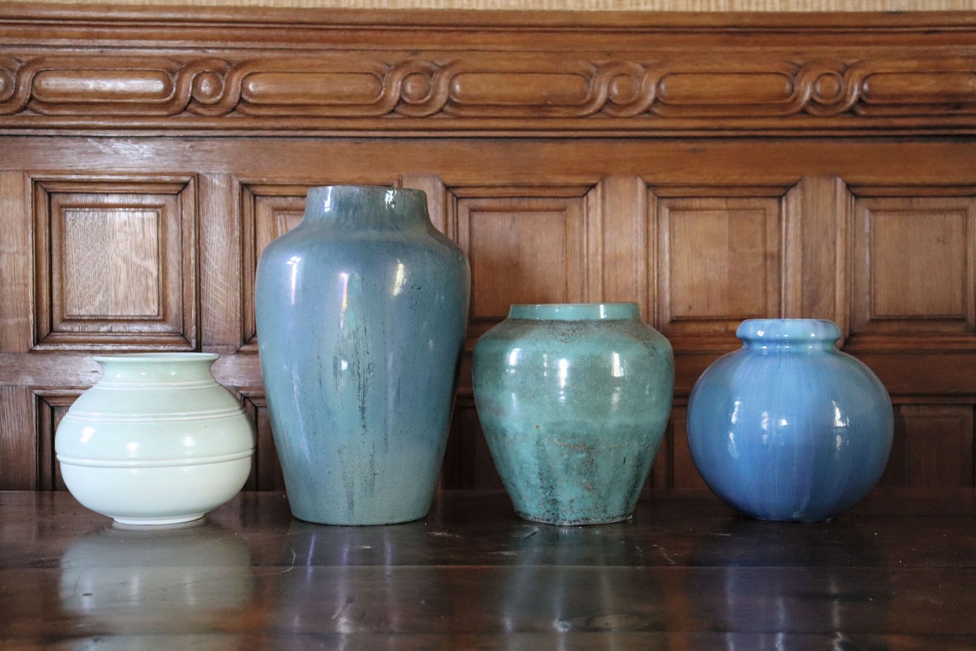 Null Four glazed stoneware vases. Signed.
First half of the 20th century.