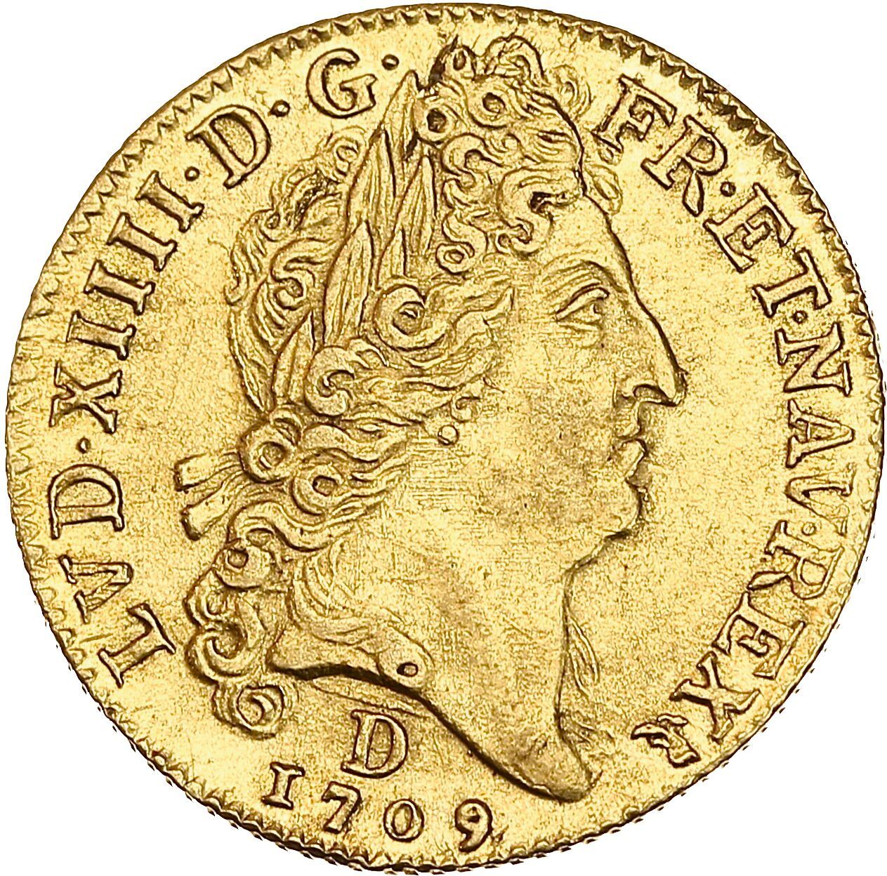 Null 路易十四 
阳光下的金路易。1709.里昂。8.20克。
国王头部在右边，戴着大假发。
R/ 八个L的十字架倾斜，中间有一个太阳，在四朵百合花之间。
&hellip;