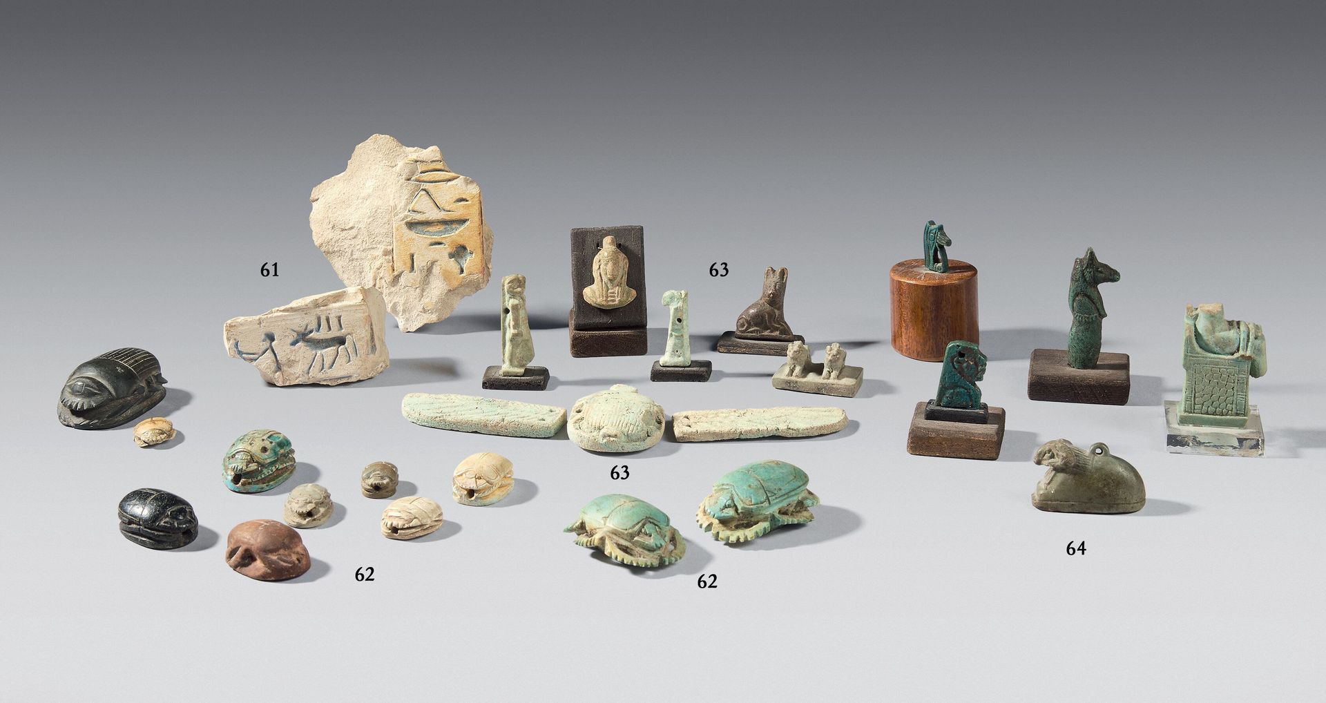 Null Lot of five amulets including a winged scarab, a bust of Isis, two Khnum, a&hellip;