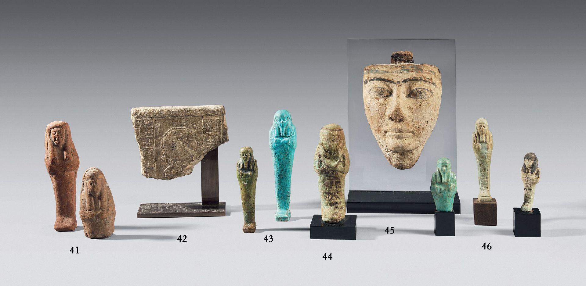 Null Two epigraphic oushebtis in faience, one green and one blue. 
Egypt, Ptolem&hellip;