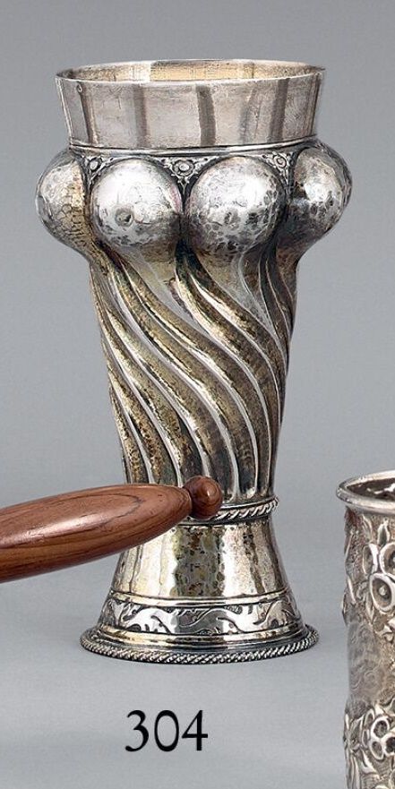 Null Silver goblet, 800 thousandths, decorated with twisted ribs and cupules.
Ge&hellip;