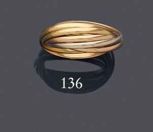 Null Cartier Paris, firmato.
Sette anelli rigidi intrecciati in oro multicolore &hellip;