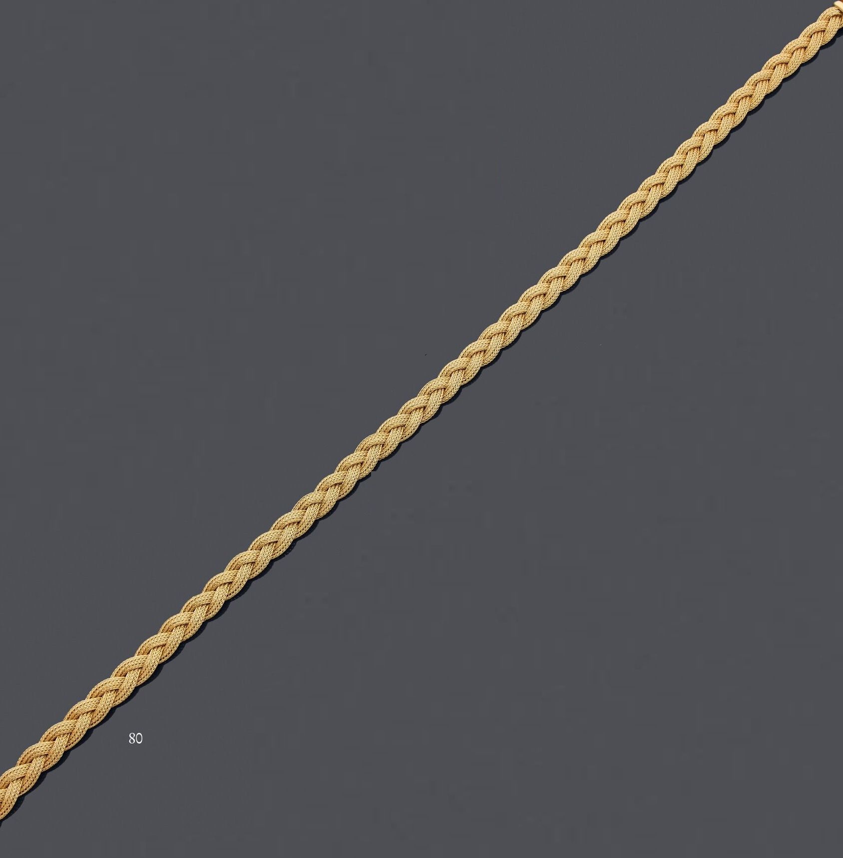 Null 75 万分之黄金柔性项链，刻有辫子。 
长度：42 厘米
毛重：35.1 克