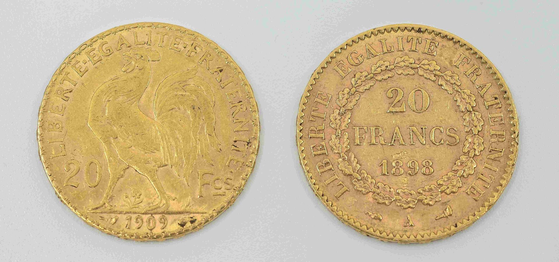 Null Conjunto de 2 monedas de oro francesas de 900°°:
- al gallo 1909. PN : 6,44&hellip;