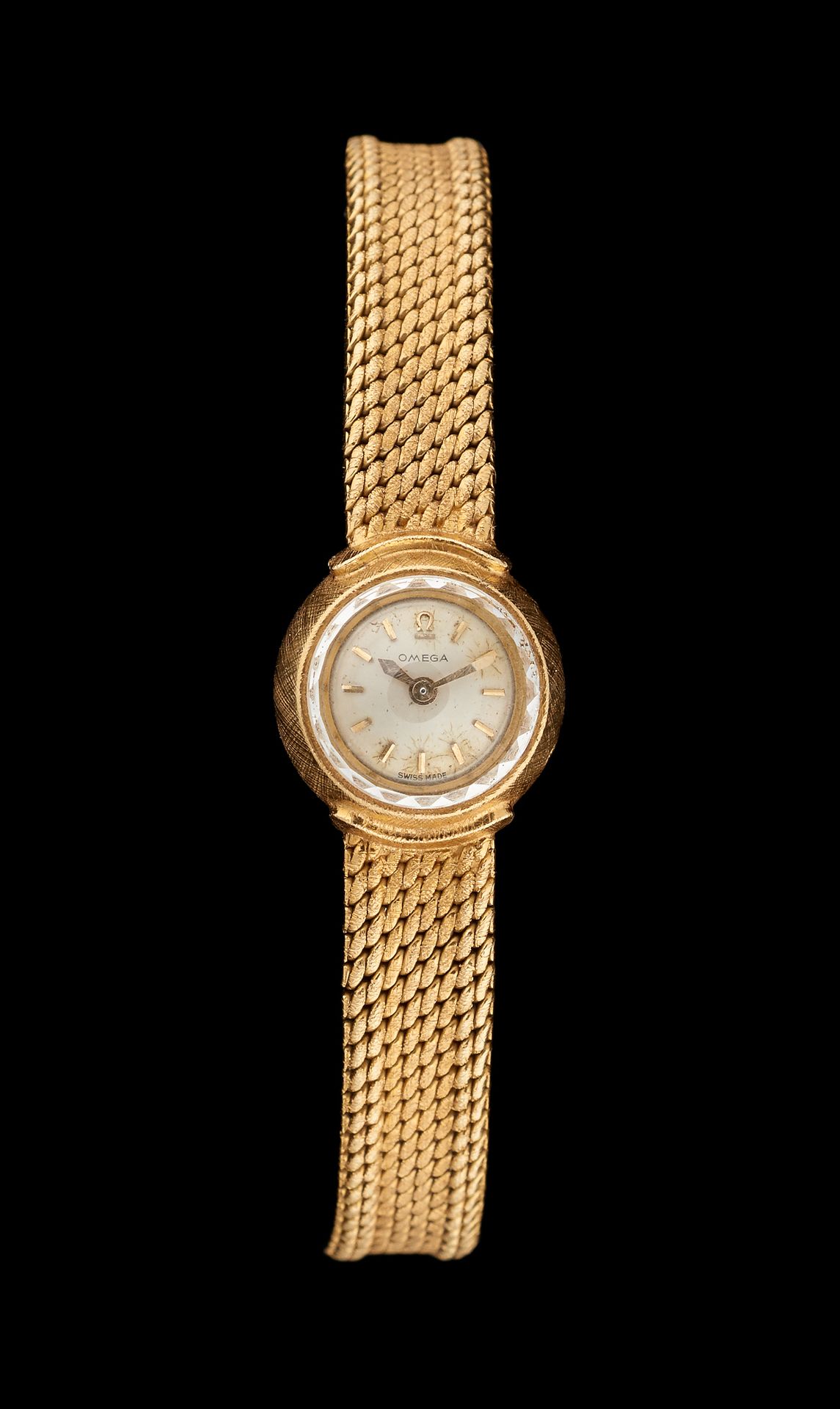OMEGA. 手表：18K黄金的完整女式表链，机械机芯。

欧米茄品牌。

毛重31克。