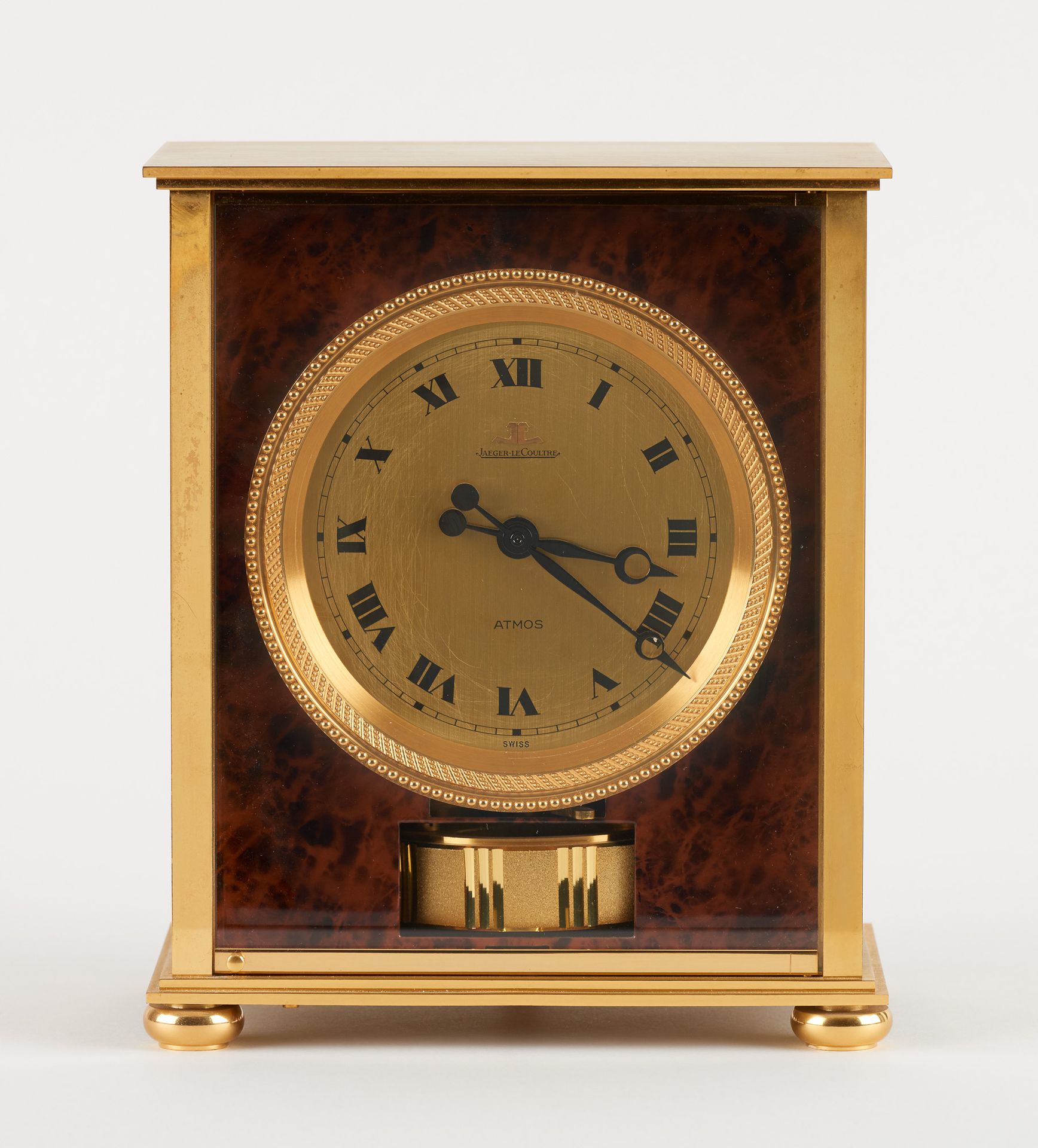 JAEGER LECOULTRE. Clockwork: Brass clock with trompe l'oeil of walnut burr.

Jae&hellip;