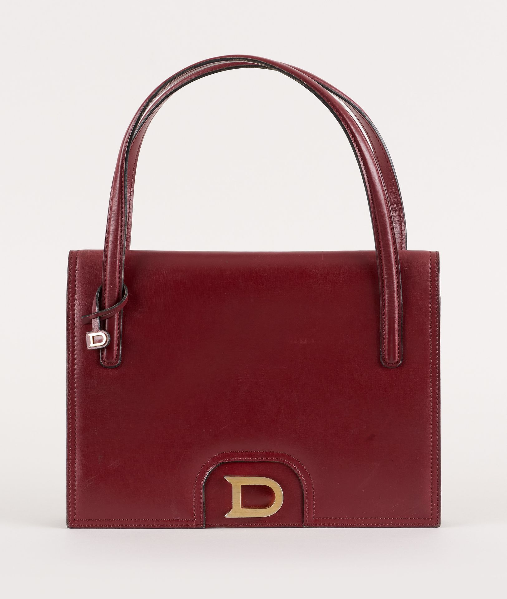 Delvaux, circa 1990. Leather goods: Bag in burgundy leather.

From Delvaux.

(we&hellip;