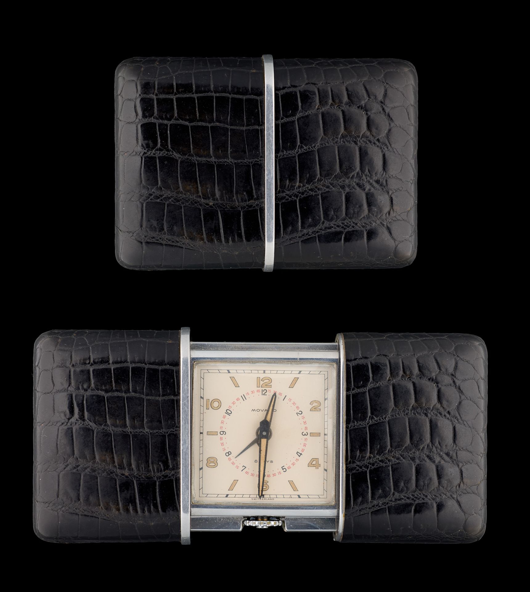 MOVADO. 钟表：皮箱中的旅行闹钟。

摩凡陀品牌，表盘上有8天提及。
