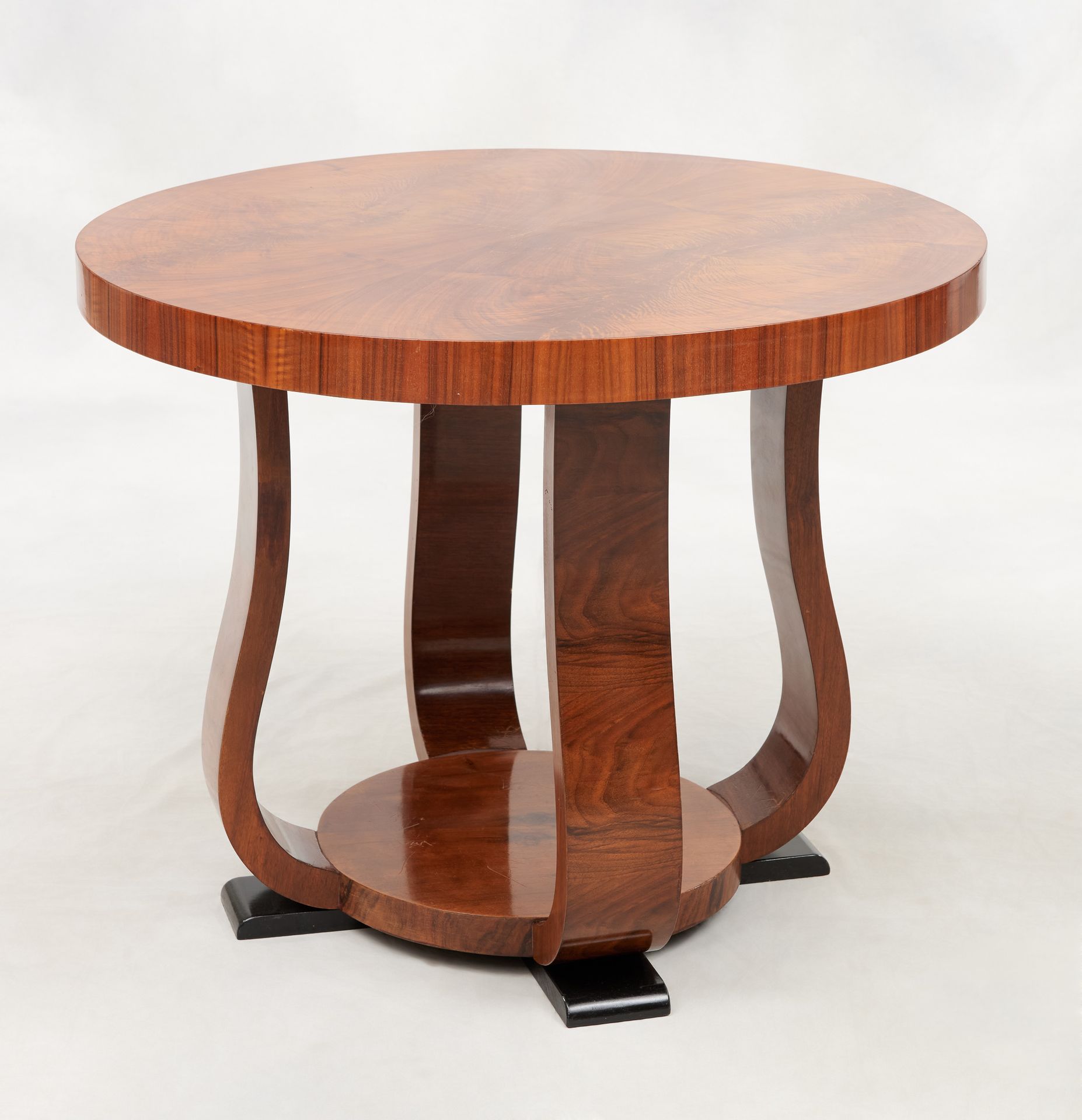 Travail Art Déco. Furniture: Walnut veneered pedestal table with circular shelf.&hellip;