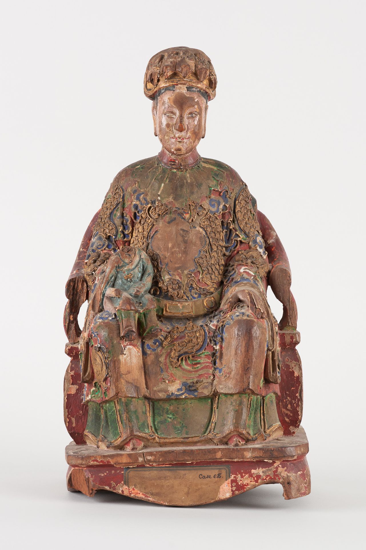 Travail chinois 18e. Polychrome wooden sculpture: Dignitary seated with a child &hellip;