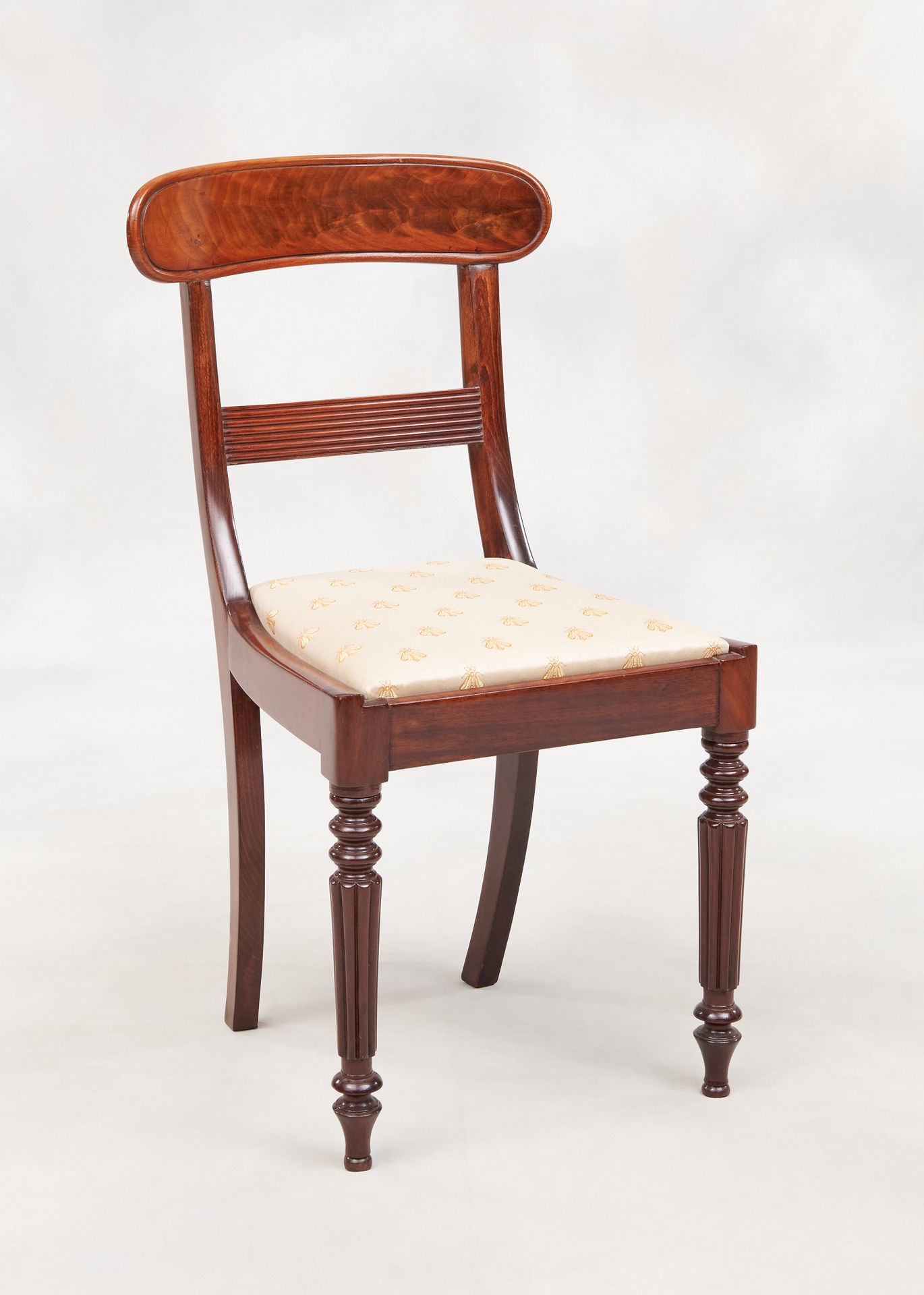 Travail du 19e. Furniture: Suite of six mahogany chairs.