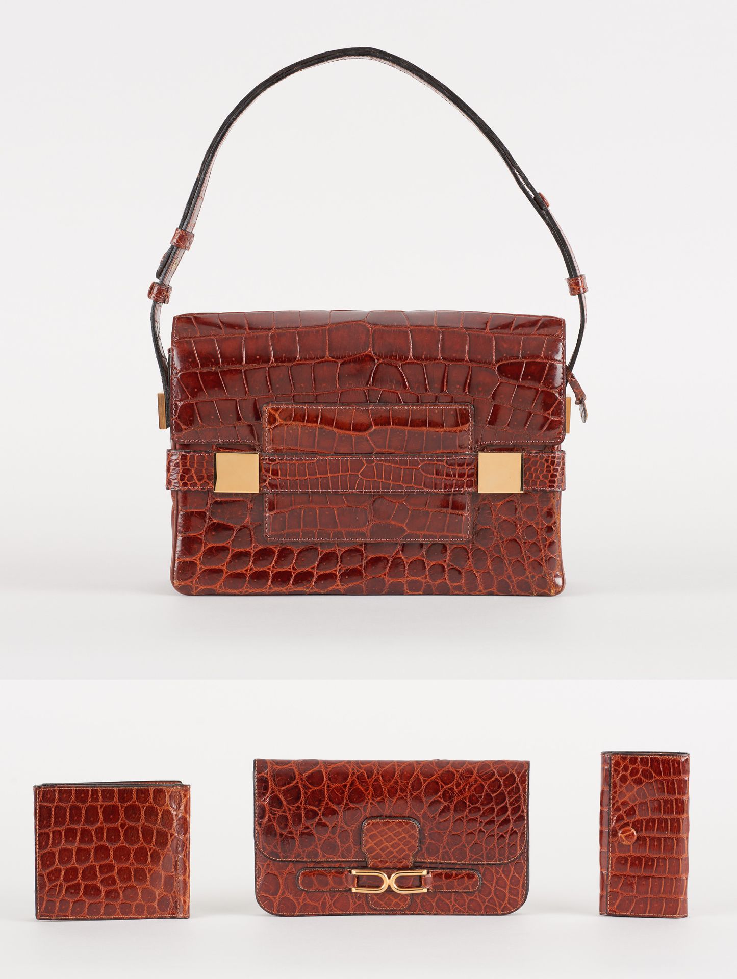 Delvaux. Leather goods: Brown crocodile skin handbag.

Delvaux brand, model "Mar&hellip;