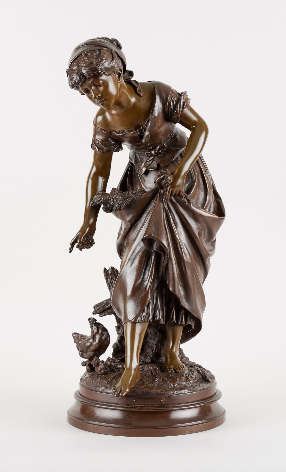 Auguste MOREAU École française (1834-1917) 双层铜质雕塑：农夫。

签名：奥古斯特-莫罗。

尺寸：高：共65厘米。
