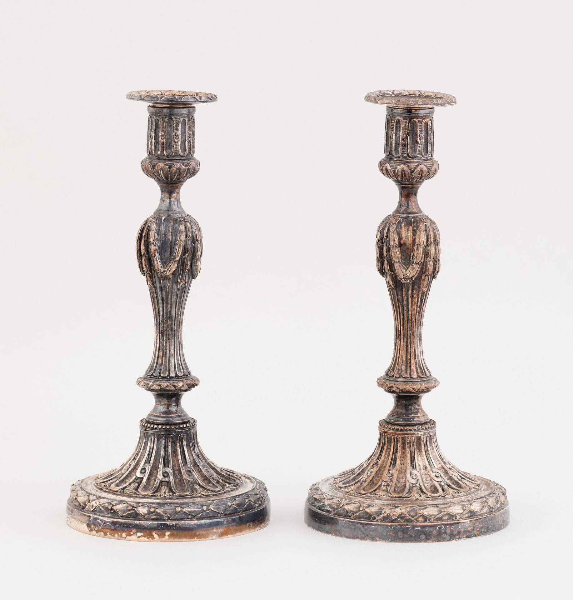 CHRISTOFLE. Silverware: Pair of silver plated candlesticks.

Christofle hallmark&hellip;