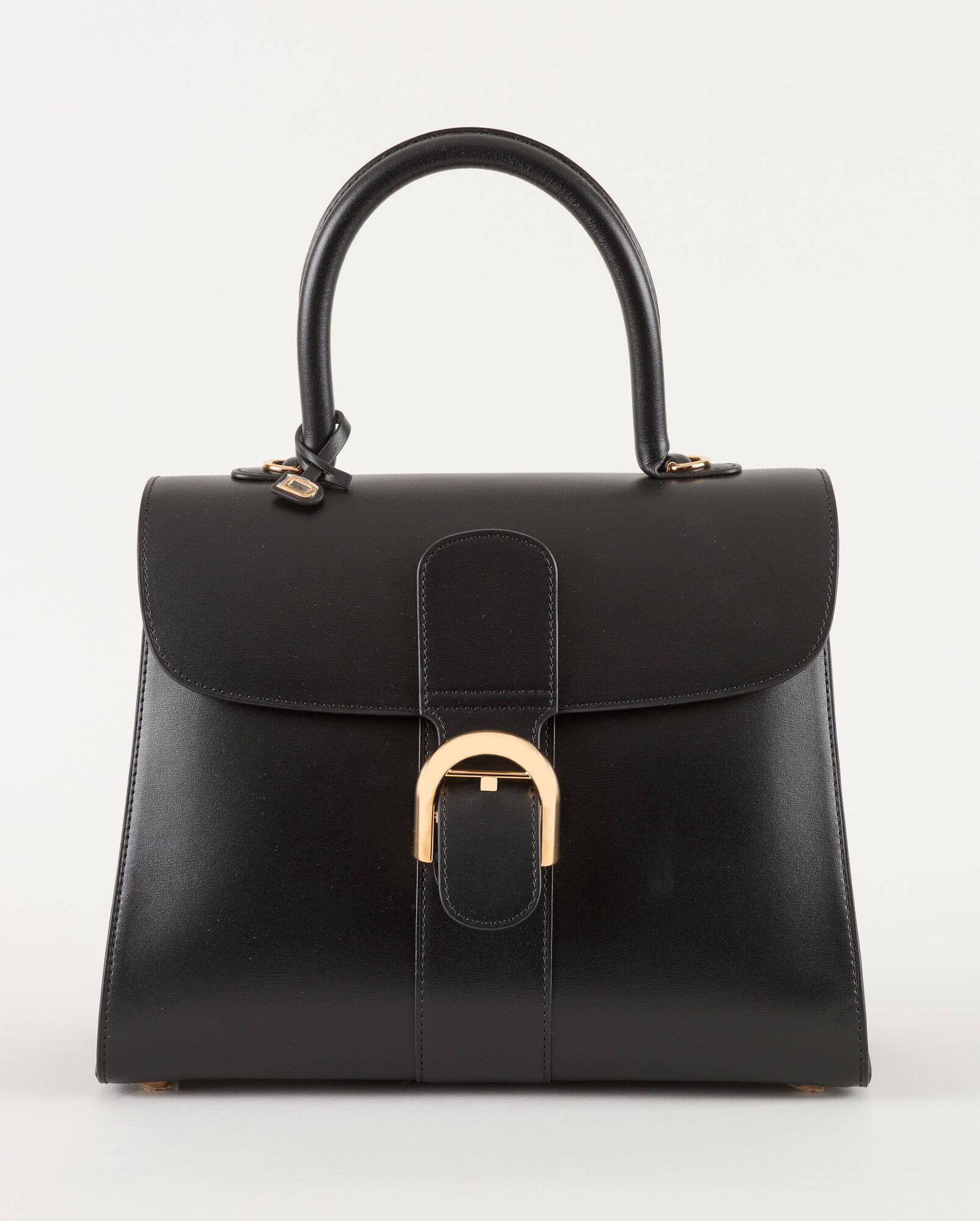 Delvaux. Leather goods: Black leather handbag, mint condition.
Delvaux brand, "B&hellip;