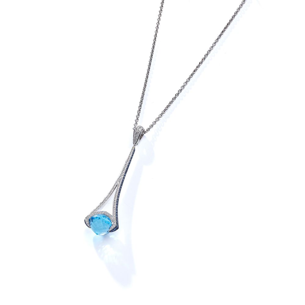 A blue topaz, diamond and sapphire pendant 悬挂一颗花式切割的蓝色托帕石，配以密镶明亮式切割钻石和圆形切割蓝宝石的分叉&hellip;