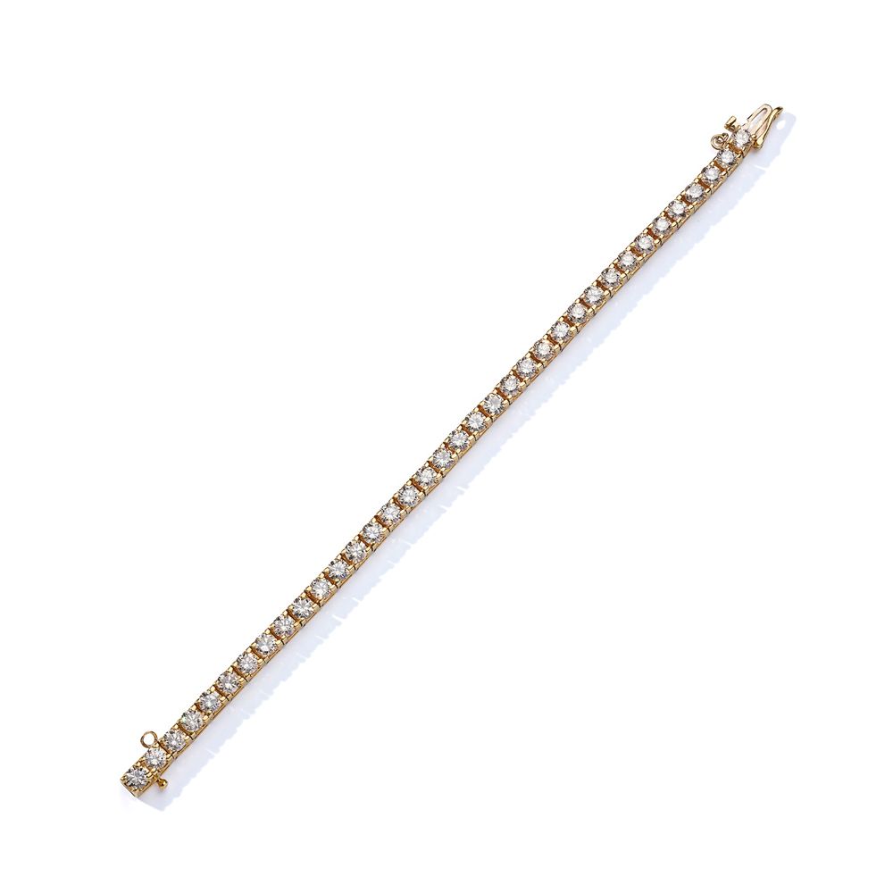 A diamond line bracelet 

 （长度：18.0厘米），四爪镶有一排连续的明亮式切割钻石。