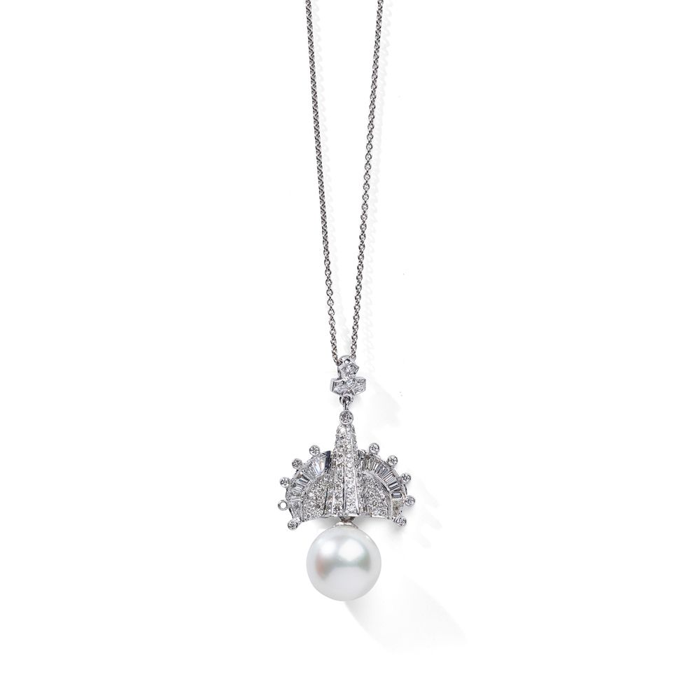 A cultured pearl and diamond pendant The 13.4mm cultured pearl suspended from a &hellip;