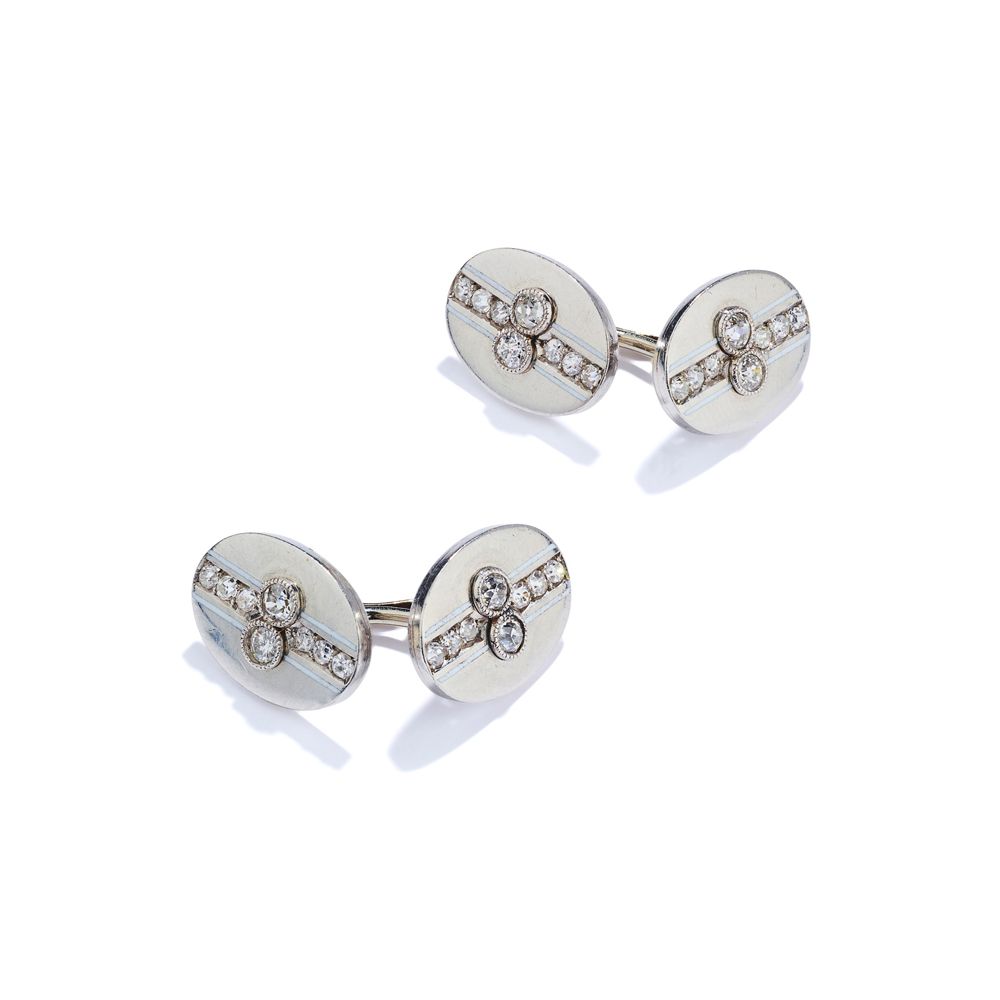 A pair of early 20th century diamond and white enamel cufflinks, circa 1920 Dobl&hellip;