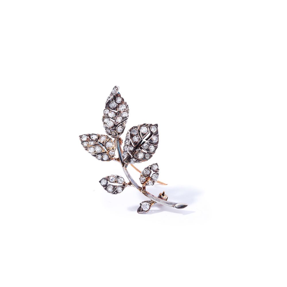 A late 19th century diamond brooch, circa 1890 造型为叶状树枝，通体镶嵌老式明亮式切割钻石，安装在银和金

 （长&hellip;
