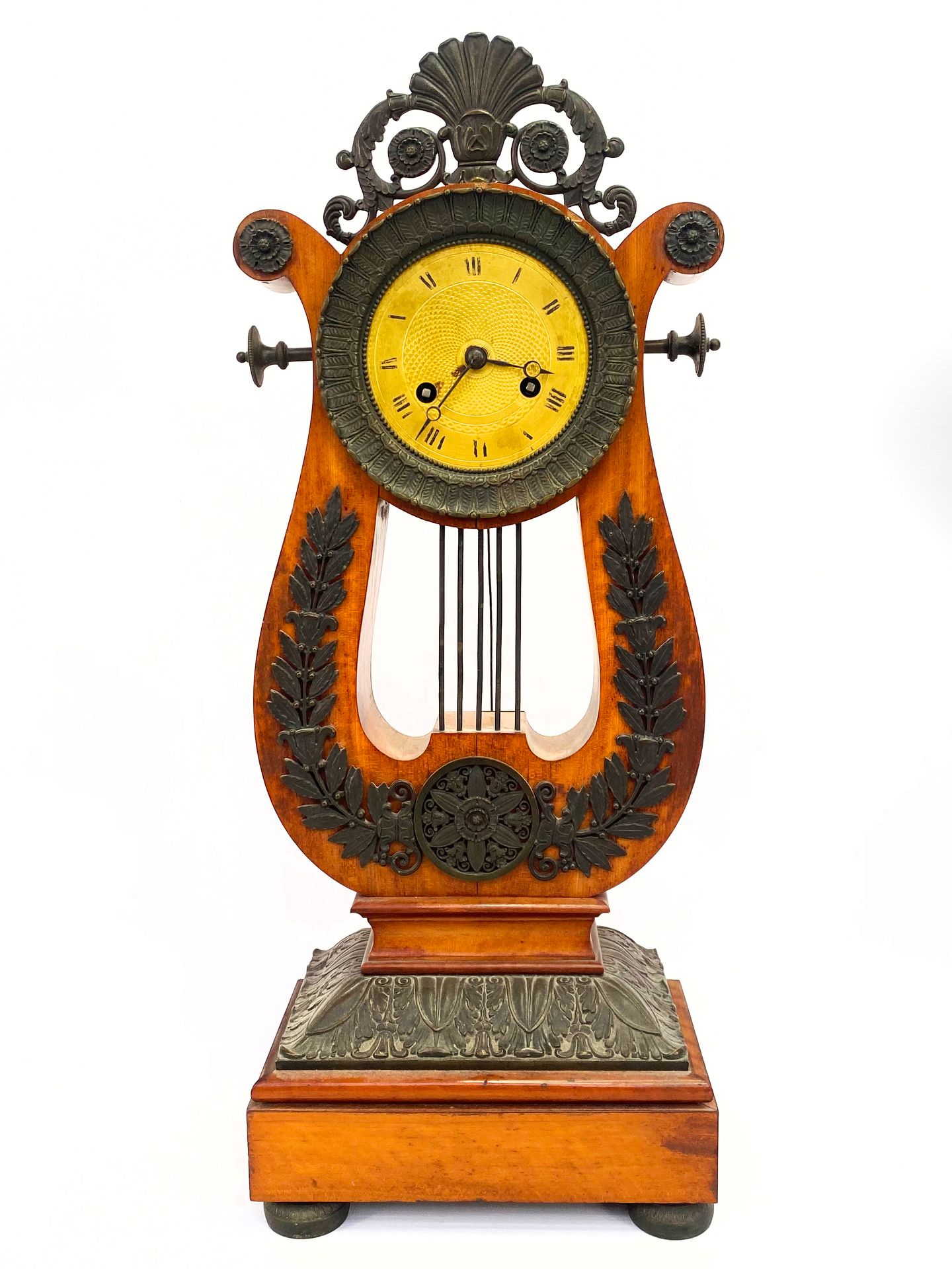 Null Lyre clock in wood and wood veneer with bronze appliques with brown patina.&hellip;