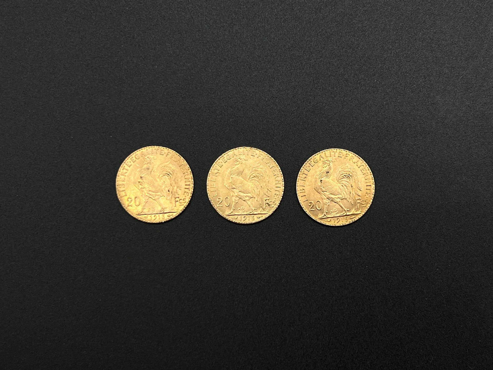 Null Lote de tres monedas de oro de 20 francos con el gallo del año 1913.

Peso &hellip;