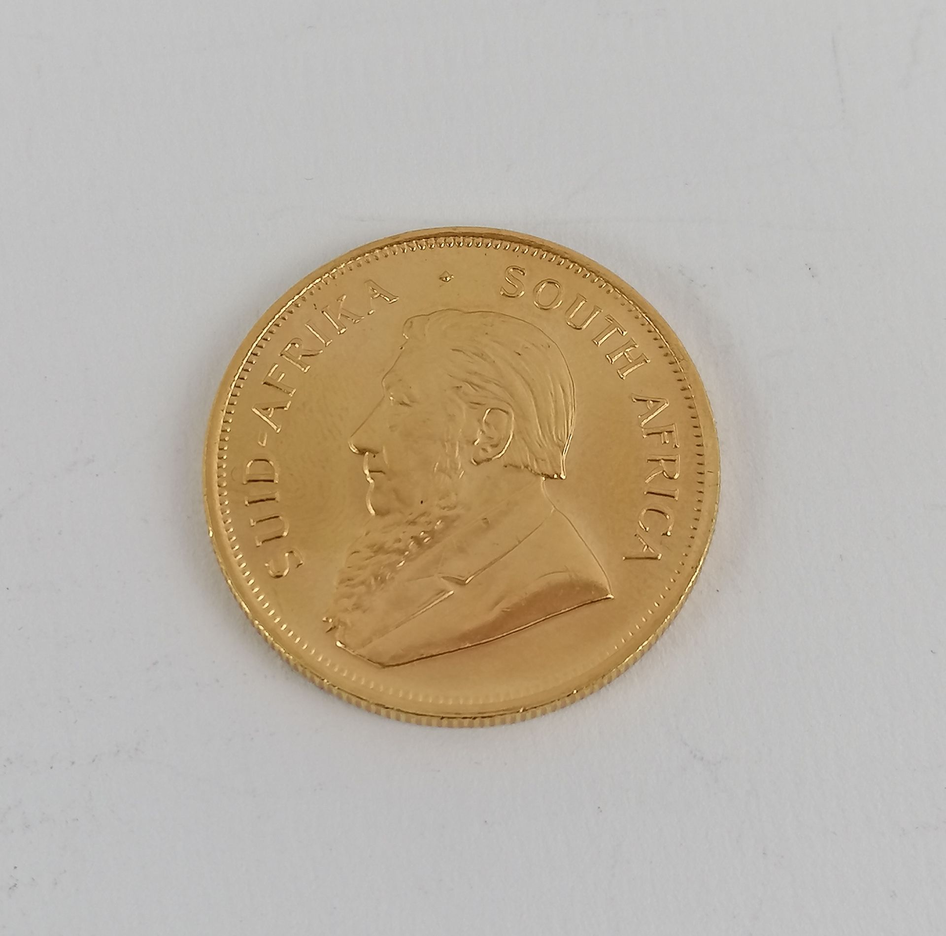 Null Eine Goldmünze Südafrika Kruggerand 1983.
Gewicht: 34 g