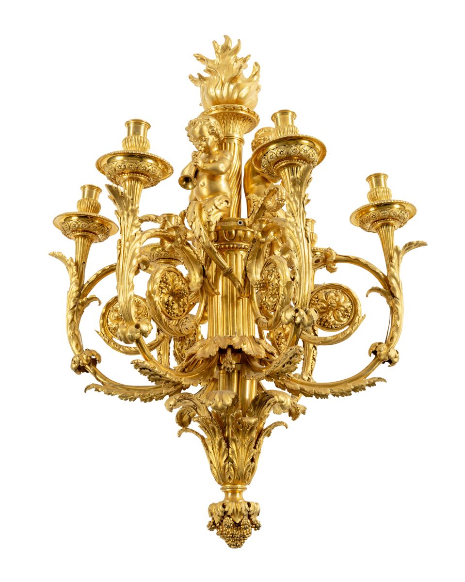 Null A gilt bronze chandelier with six scrolled lights surmounted by child blowe&hellip;
