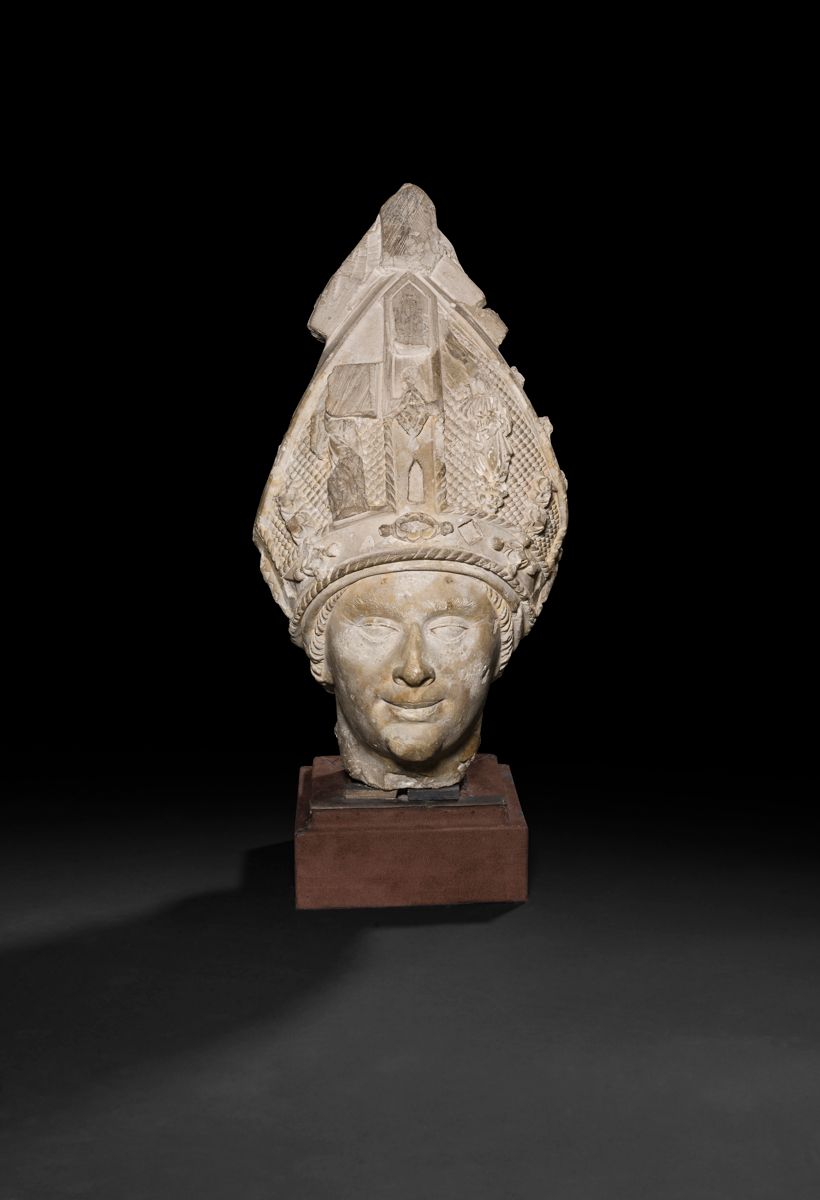 Null 勃艮第，Antoine le Moiturier的随行人员，15
世纪
下半叶，
石灰岩雕刻的主教
头像。
它的顶部有一顶帽子和一个大的斜塔，上面装饰&hellip;