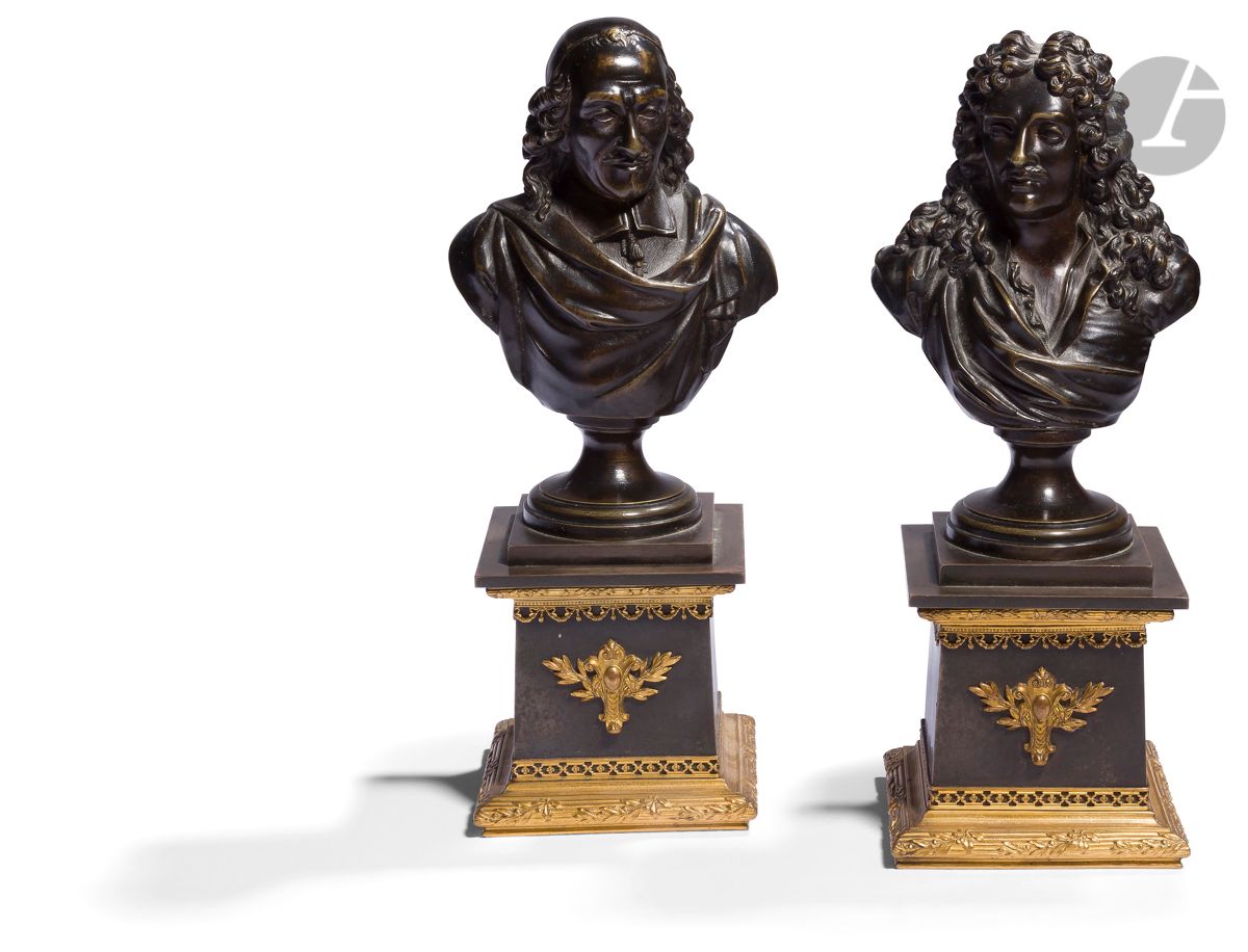 Null 
 
Dos bustos de bronce con pátina marrón que descansan sobre un pedestal y&hellip;