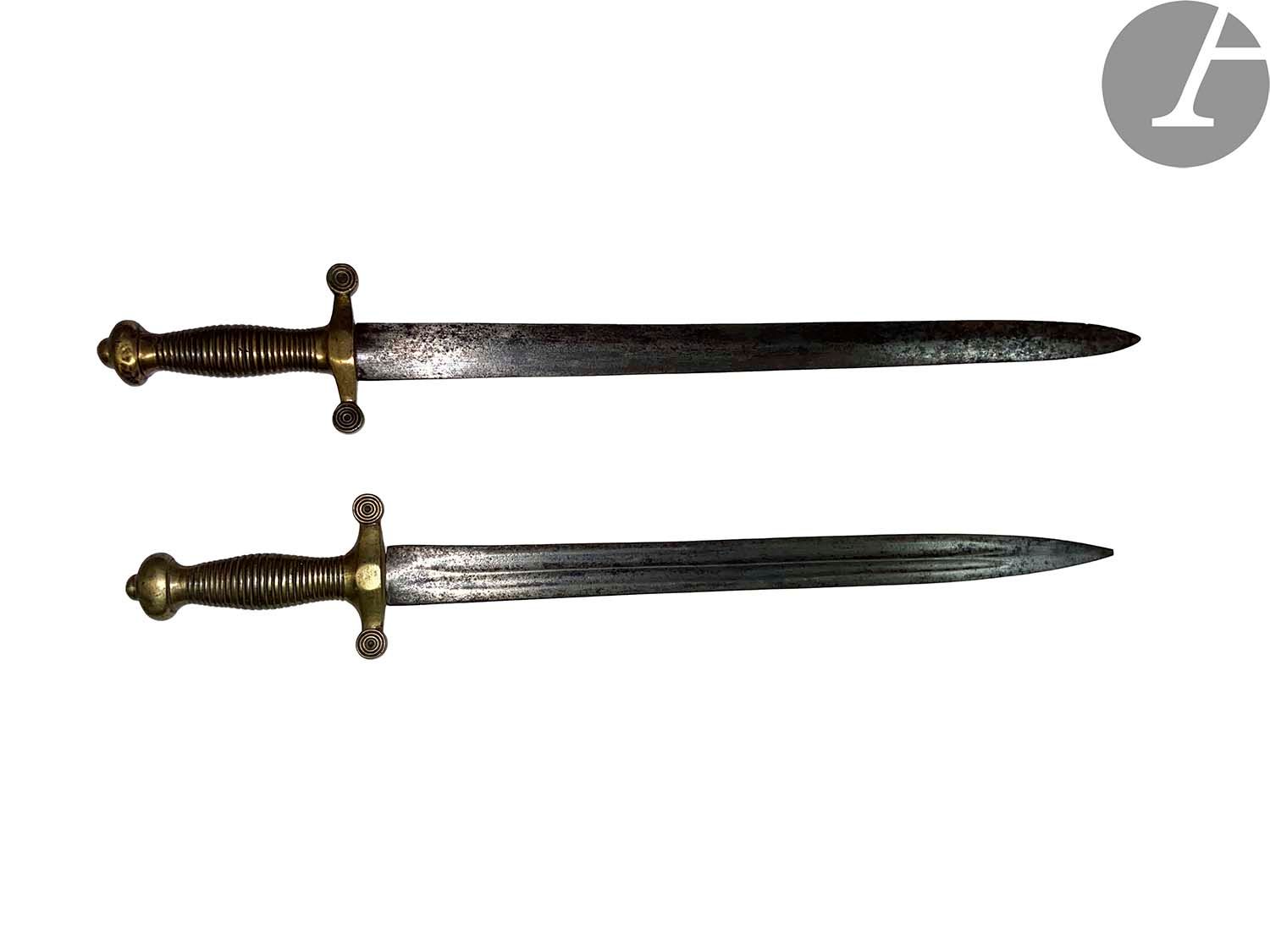 Null Two swords of cantinière model 1855. 
Bronze mounts. One blade with gutter,&hellip;