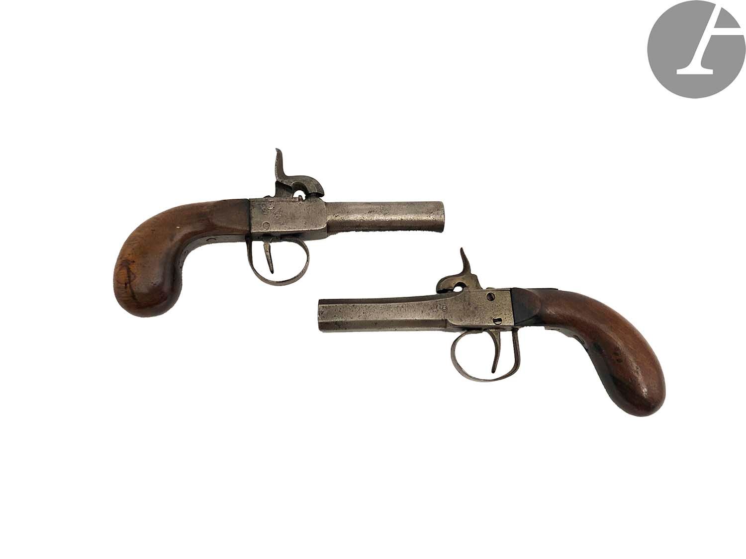 Null Two percussion cap pistols.
The first with round barrel, iron trigger guard&hellip;
