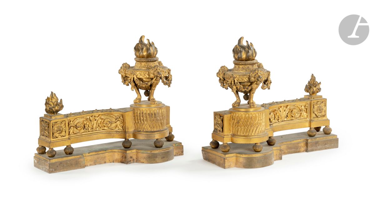 Null A pair of ormolu andirons decorated with flaming vases, lion's heads, garla&hellip;