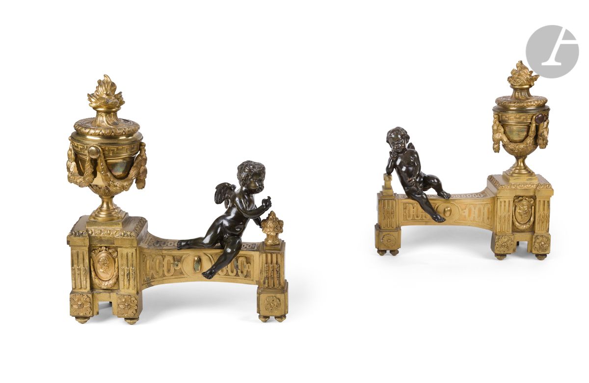 Null A pair of patinated bronze and gilt bronze andirons decorated with children&hellip;