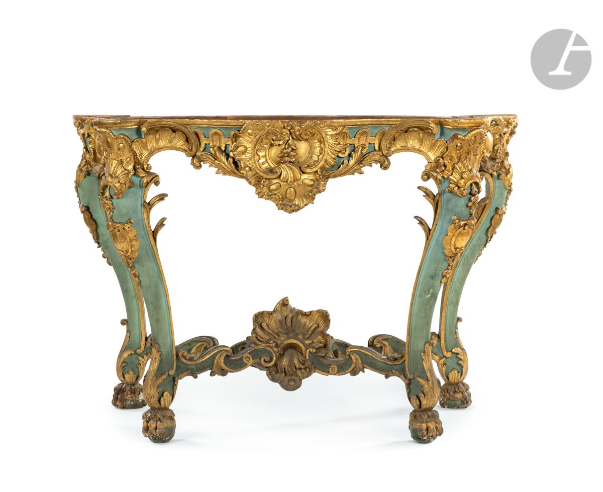 Null A painted and gilded wood console table, decorated with rocaille, foliage, &hellip;