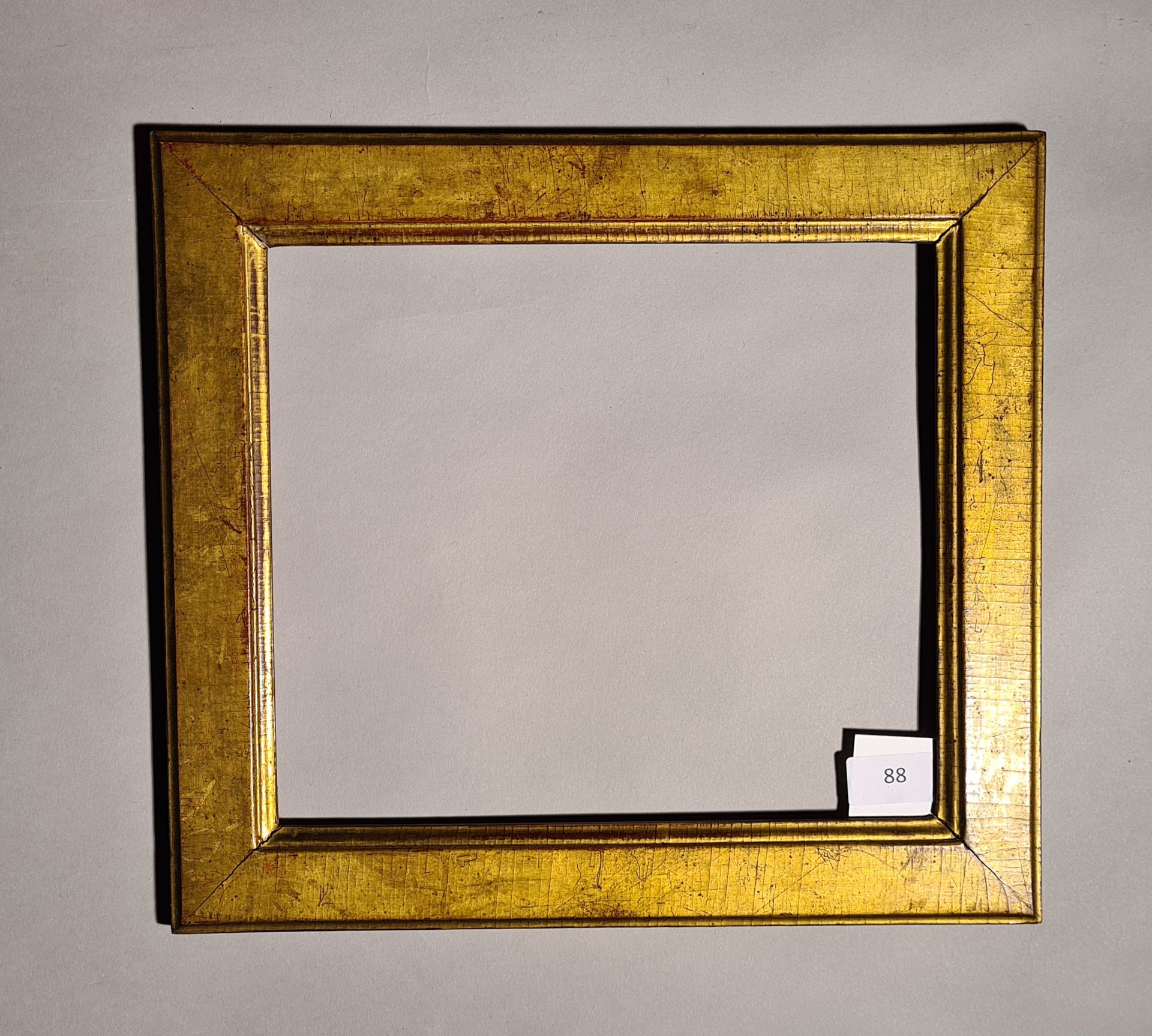 Null 
Varilla de madera plana moldeada y dorada.

Período Luis XVI (desgaste).

&hellip;