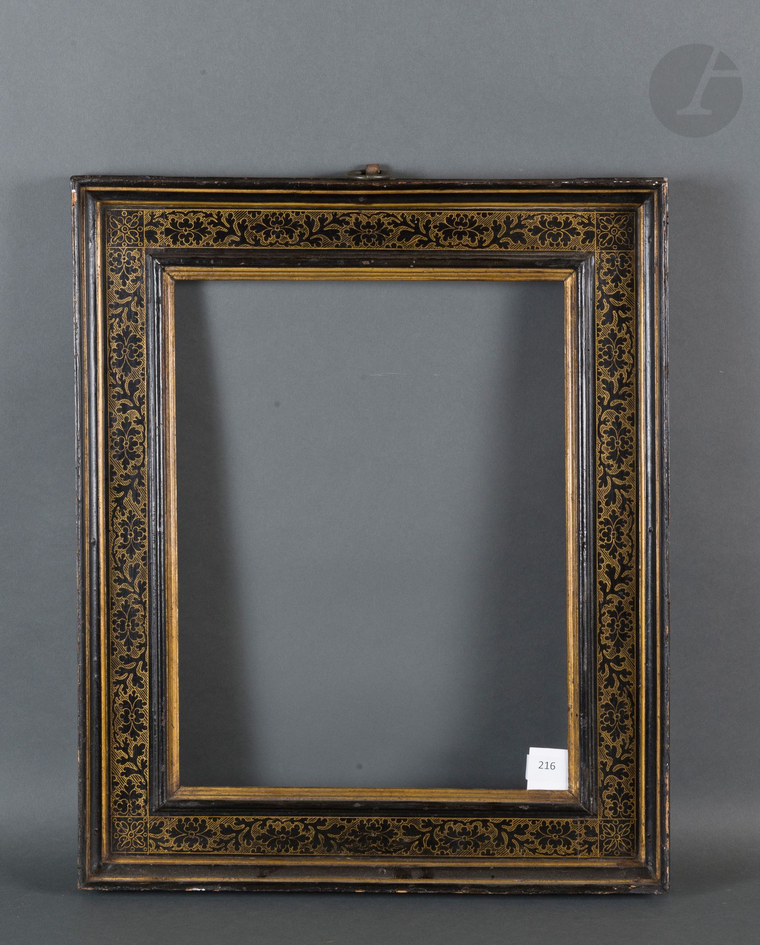 Null Cassetta frame in molded and blackened wood with gilded decoration in the T&hellip;