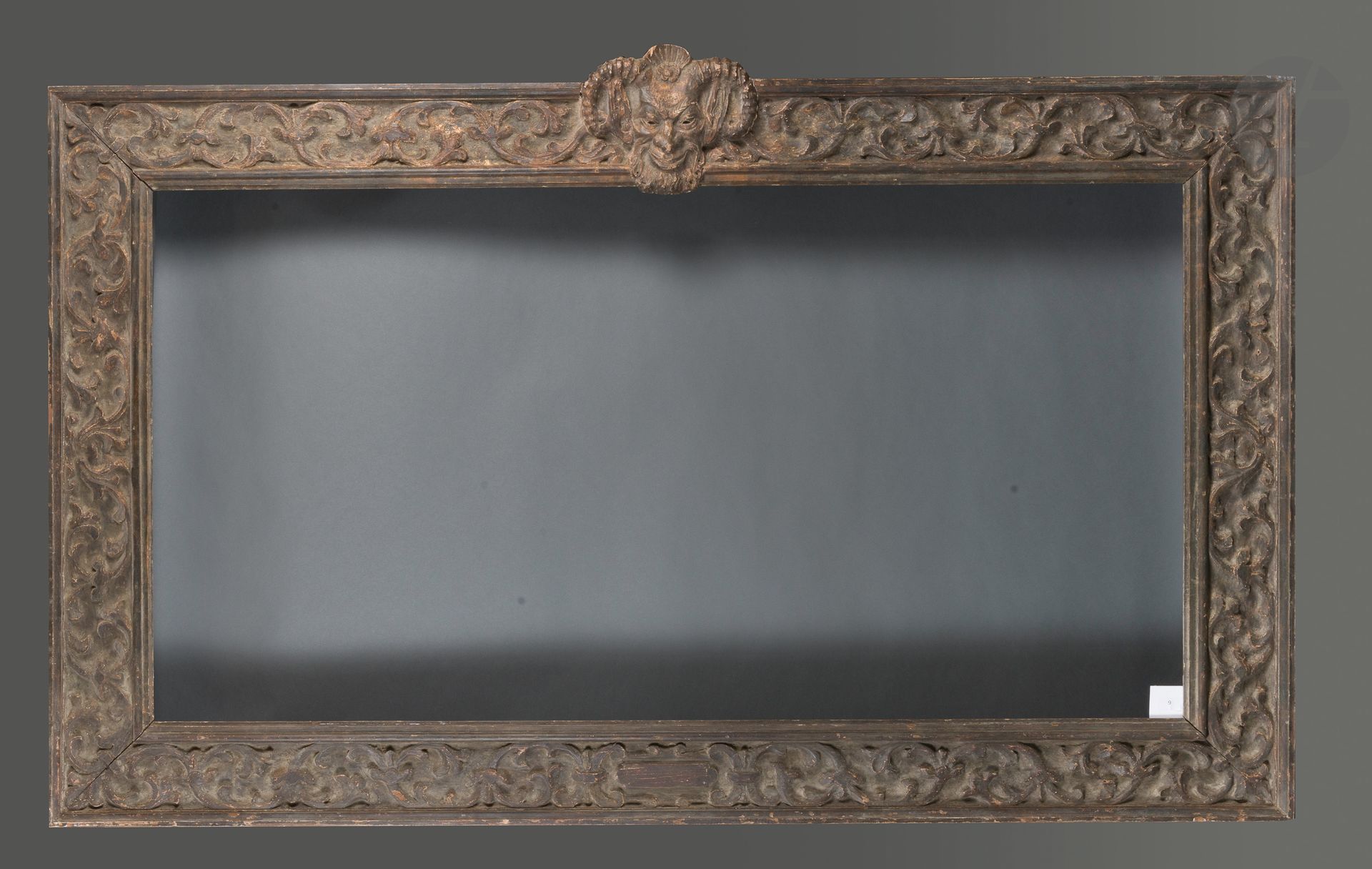 Null *Carved and painted wood frame decorated with foliage and head of fauna.Cir&hellip;