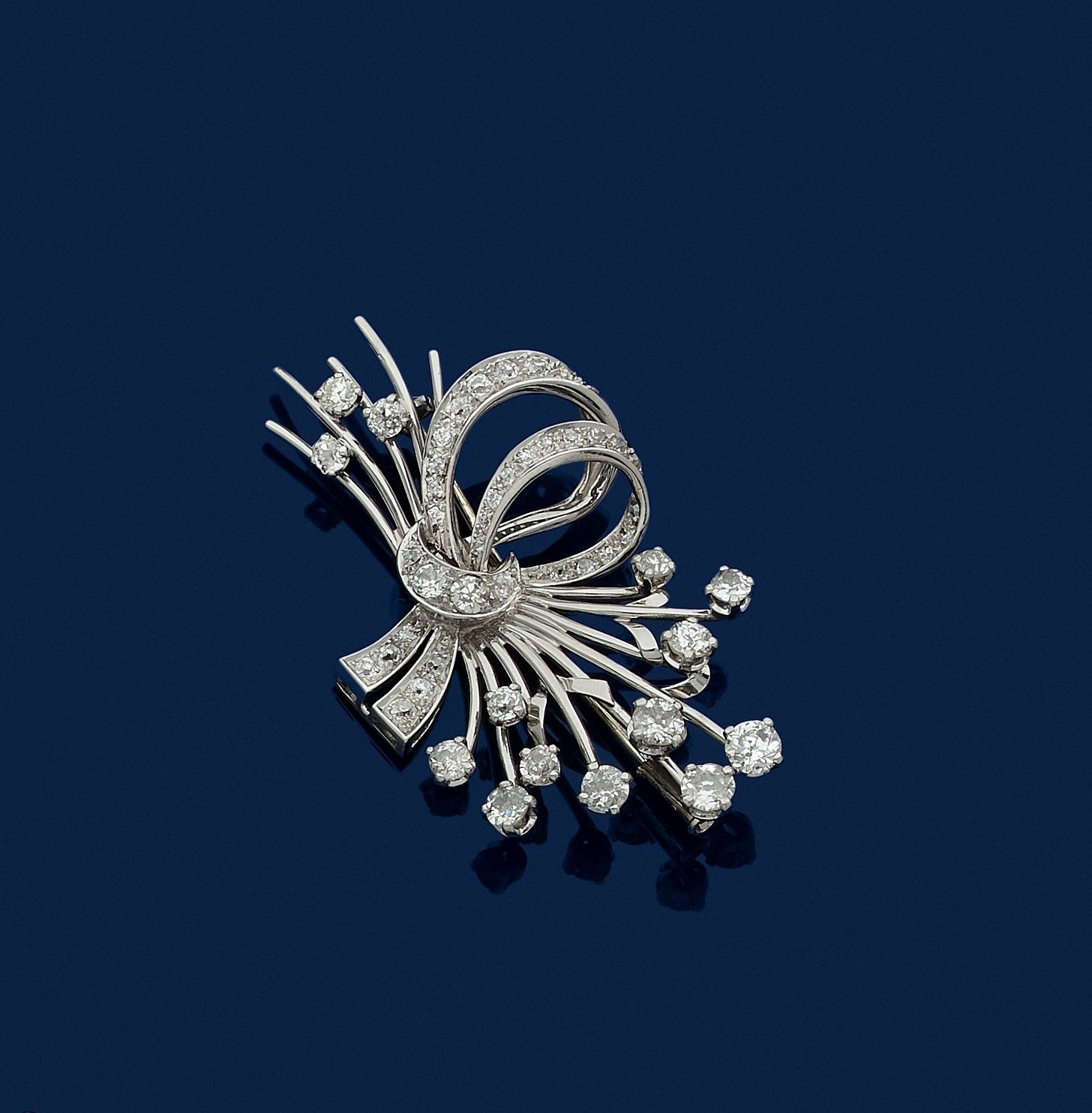 Null Platinum spray brooch set with old cut diamonds. French work of the 1950s. &hellip;